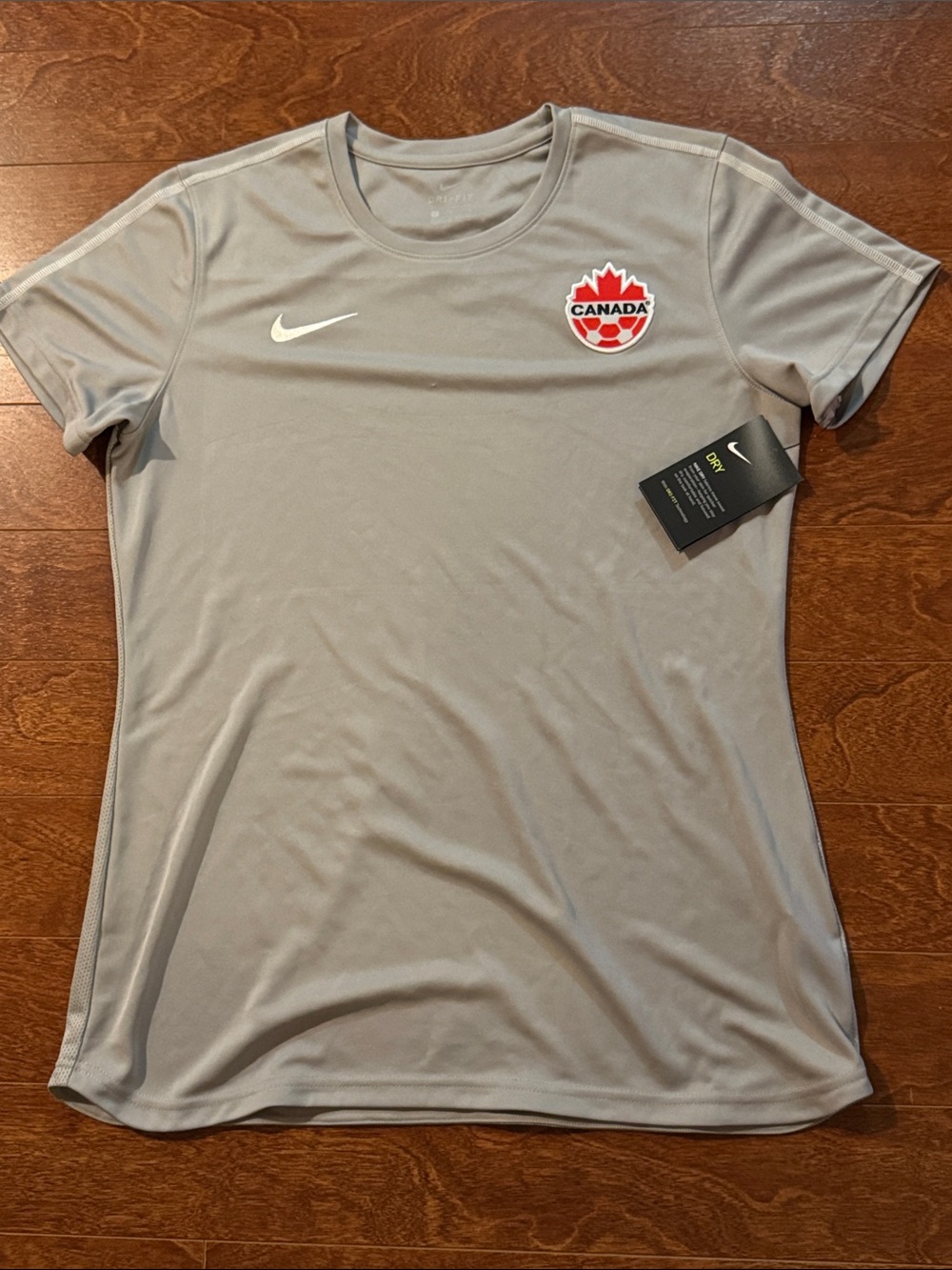 Nike Women's Light Gray Dri-FIT Canada Short Sleeve Tee